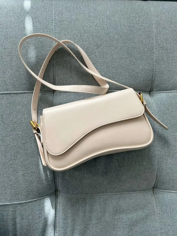Curved style crossbody bag