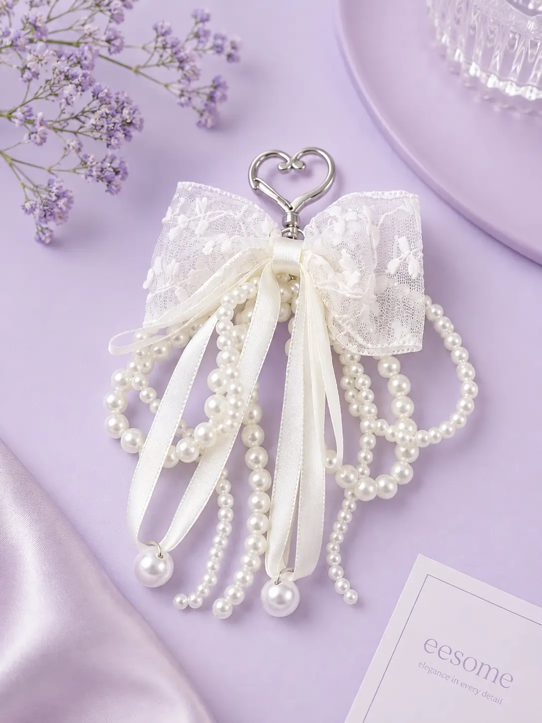 Pearl bow charm