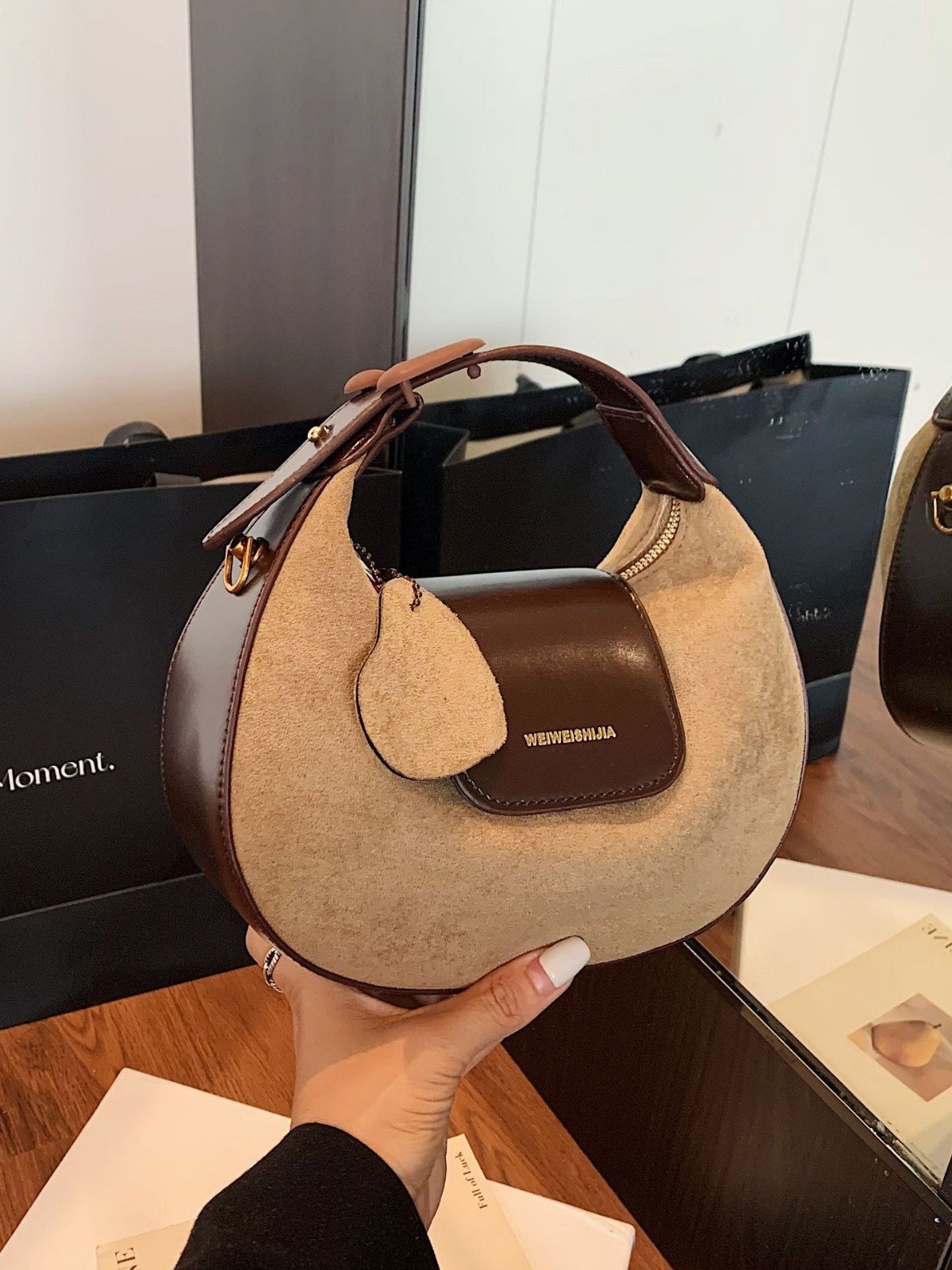 Crescent suede hobo bag